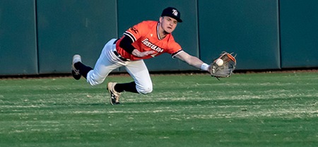 Seth DeHaven makes this diving catch to end the 3rd inning in Tusculum's 19-4 home win over King (photo by Chuck Williams)