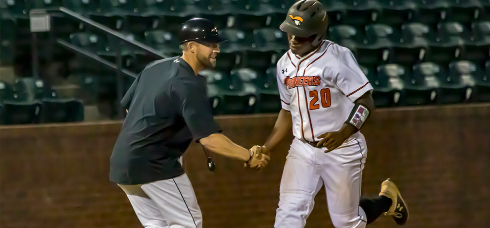 Jarel McDade is congratulated after hitting his 3-run HR in the seventh inning in TU's 9-0 win over Coker (photo by Chuck Williams)