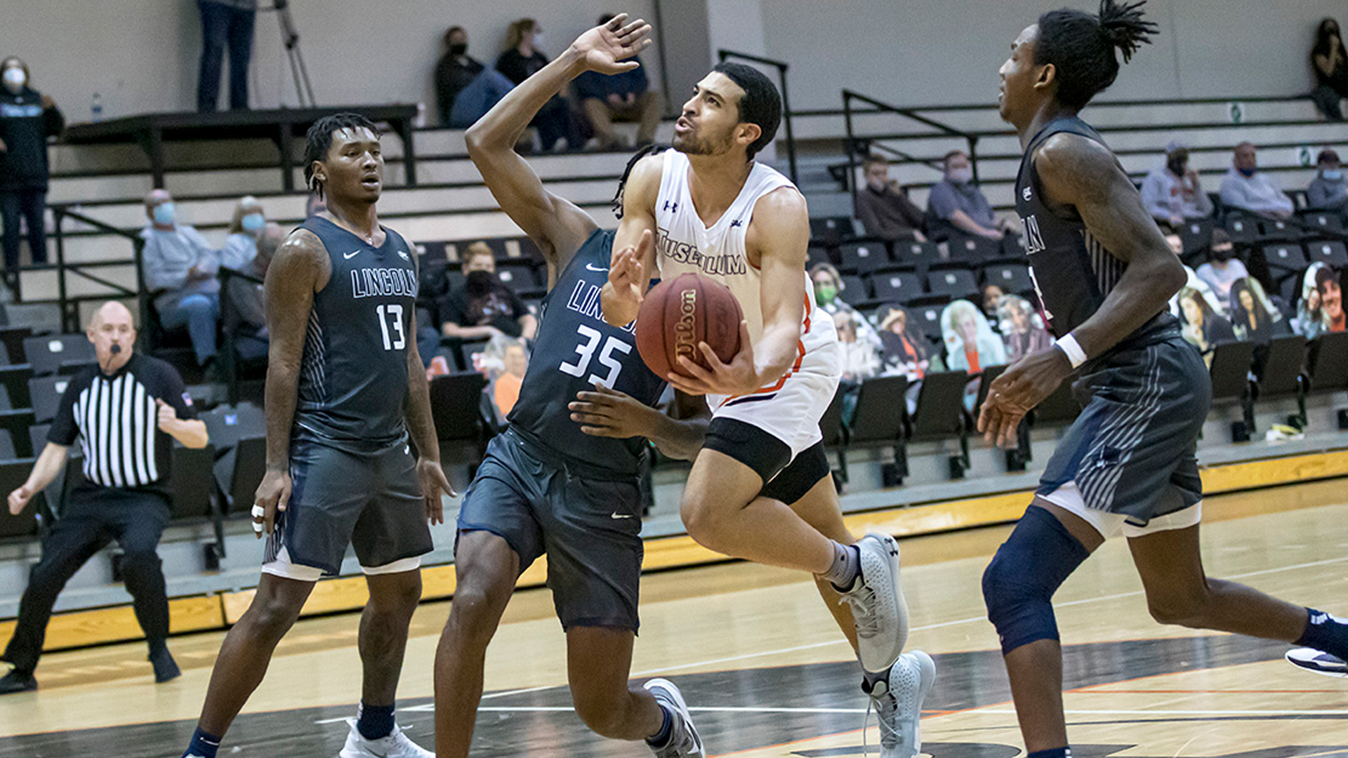 Trenton Gibson tallied 22 points and eight assists to lead Tusculum to a 90-74 win over No. 8 Lincoln Memorial (photo by Chuck Williams)