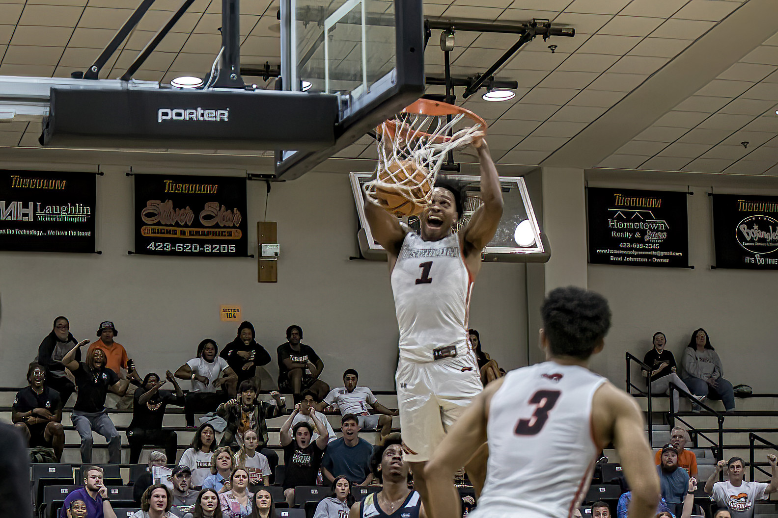 Justin Mitchell with the dunk to give Tusculum a late lead in Wednesday's SAC quarterfinal win over Wingate (photo by Chuck Williams)