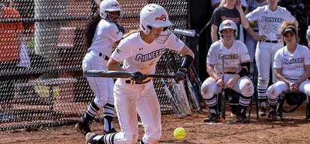 Sammie West collects one of her six hits on a bunt in game one (photo by Chuck Williams)