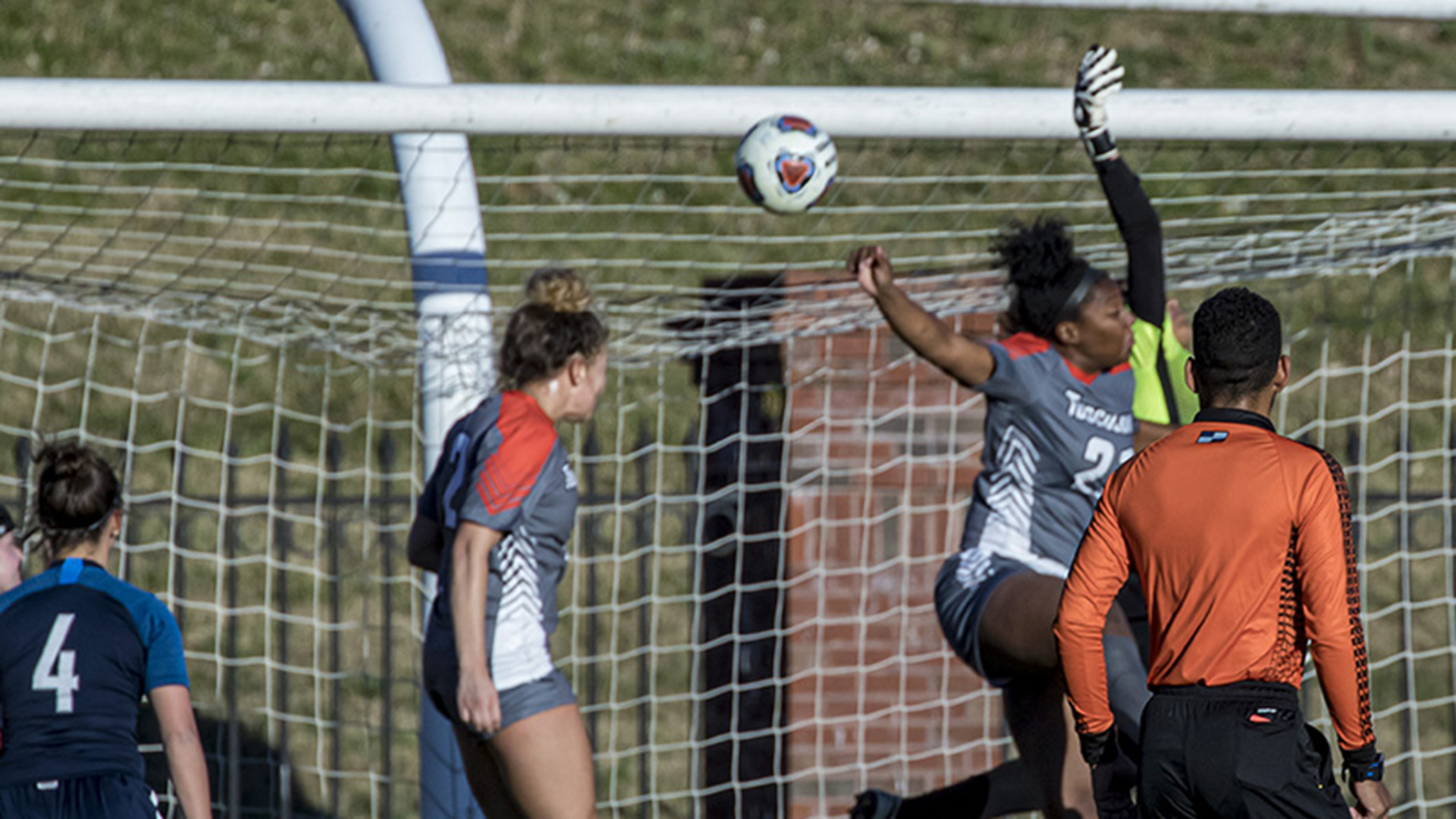 Kenzie Ellenburg connects on the header to give Tusculum a 1-0 lead (photo by Chuck Williams)
