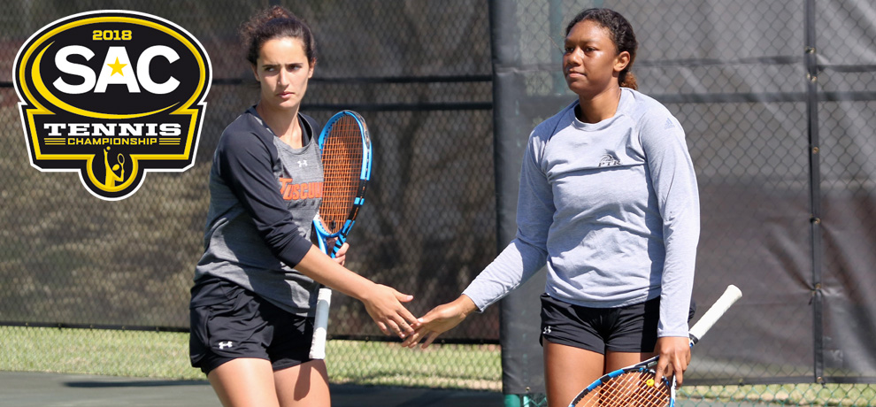 Africa Mota (left) and Amber Lackey won the opening doubles match for the Pioneers (photo by Chuck Williams)