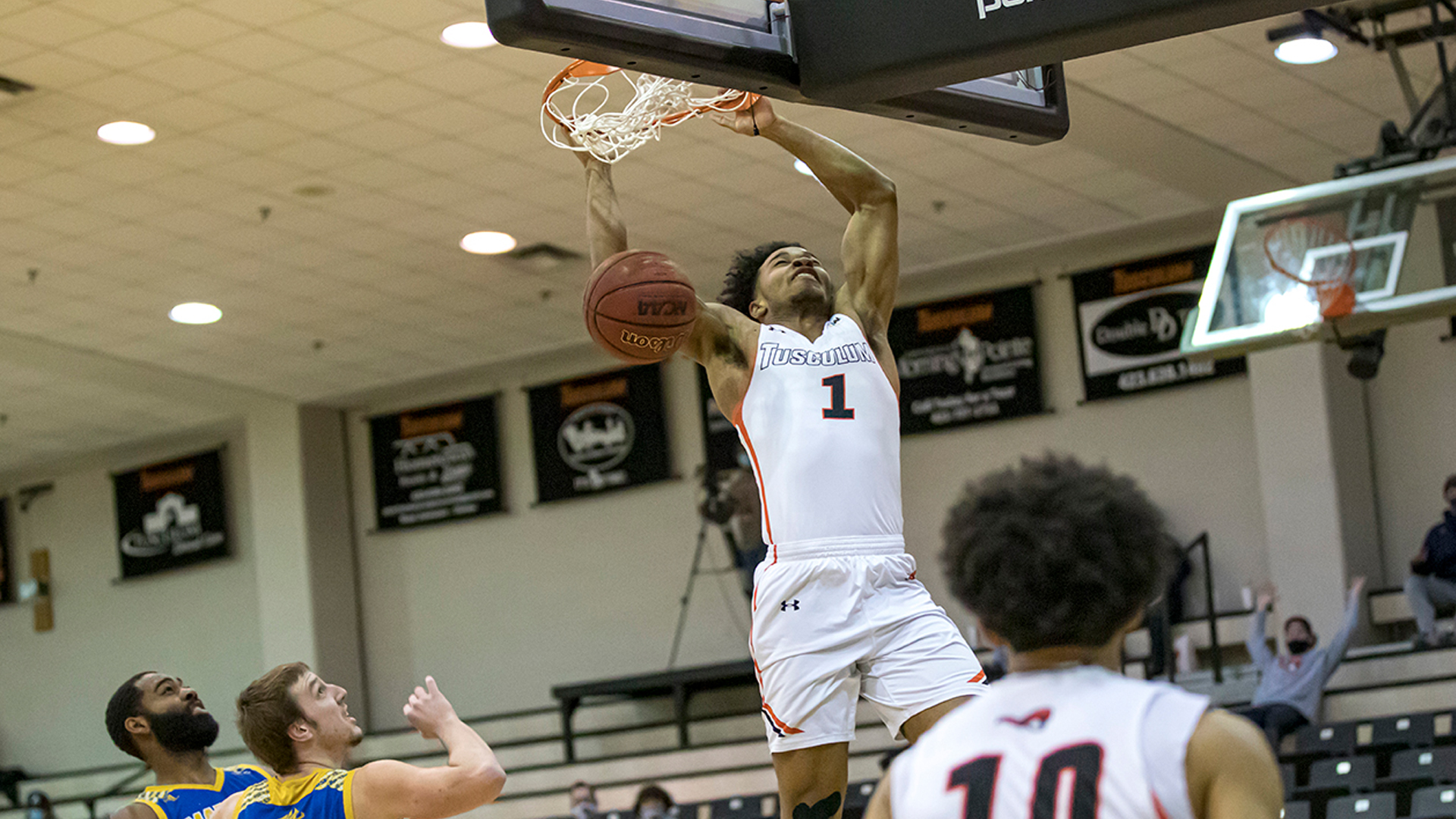 Justin Mitchell scored a career-high 15 points, including this dunk in Tusculum's 78-75 win over Mars Hill (photo by Chuck Williams)