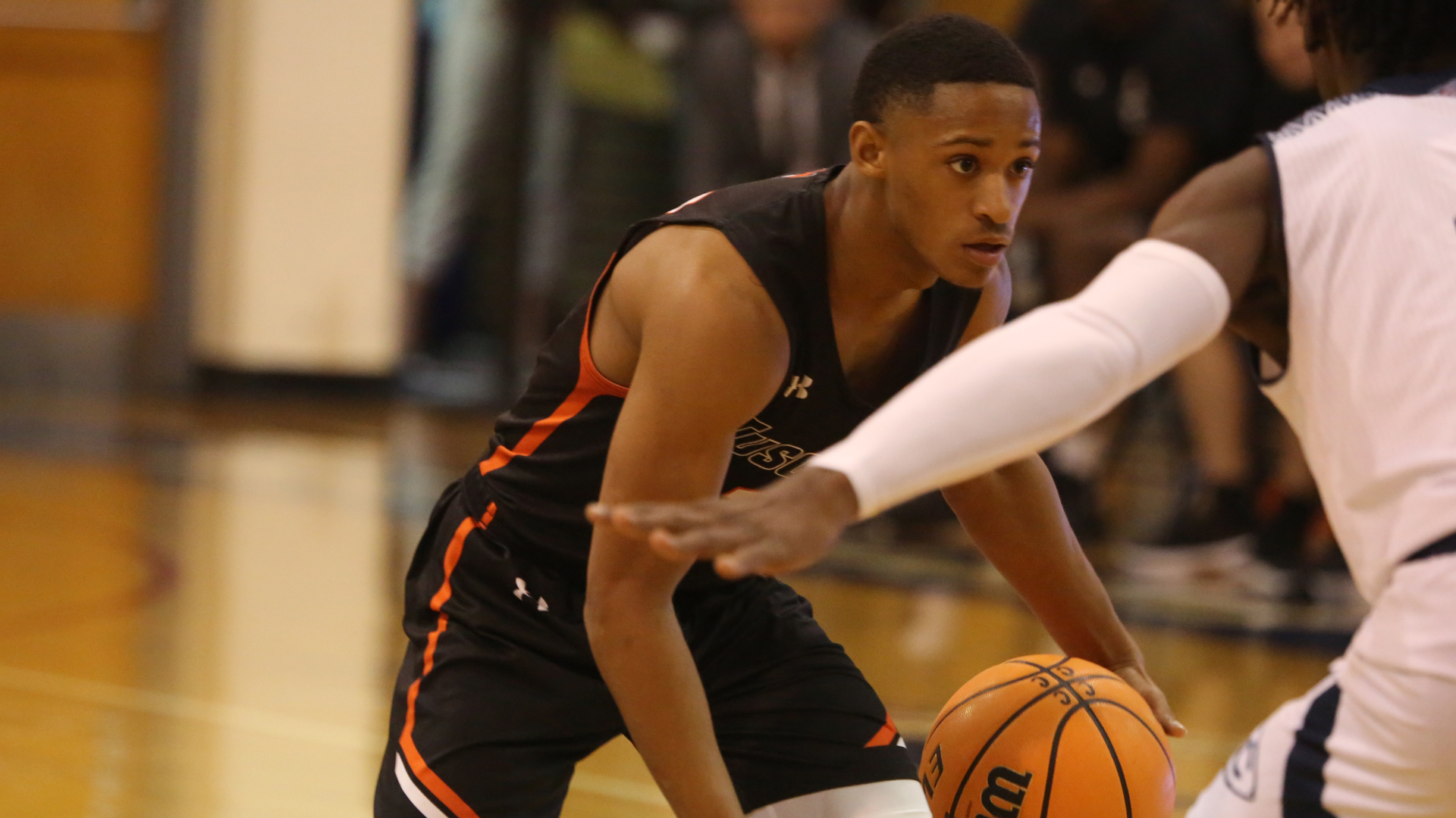 Freshman KJ Crump scored 18 points and made two key free throws with 24.6 seconds left in Tusculum's 81-74 upset win at No. 4 Queens