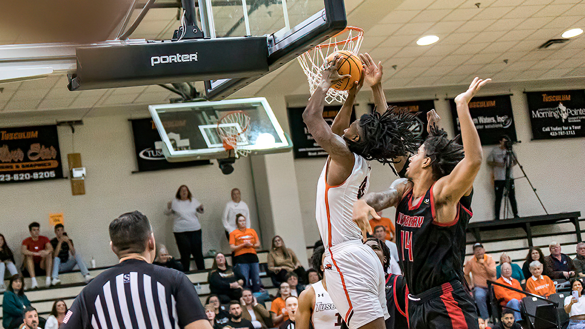 Joshua Scott's potential game-winner is blocked at the buzzer as Tusculum falls 60-59 to Newberry in SAC Quarterfinal (photo by Chuck Williams)