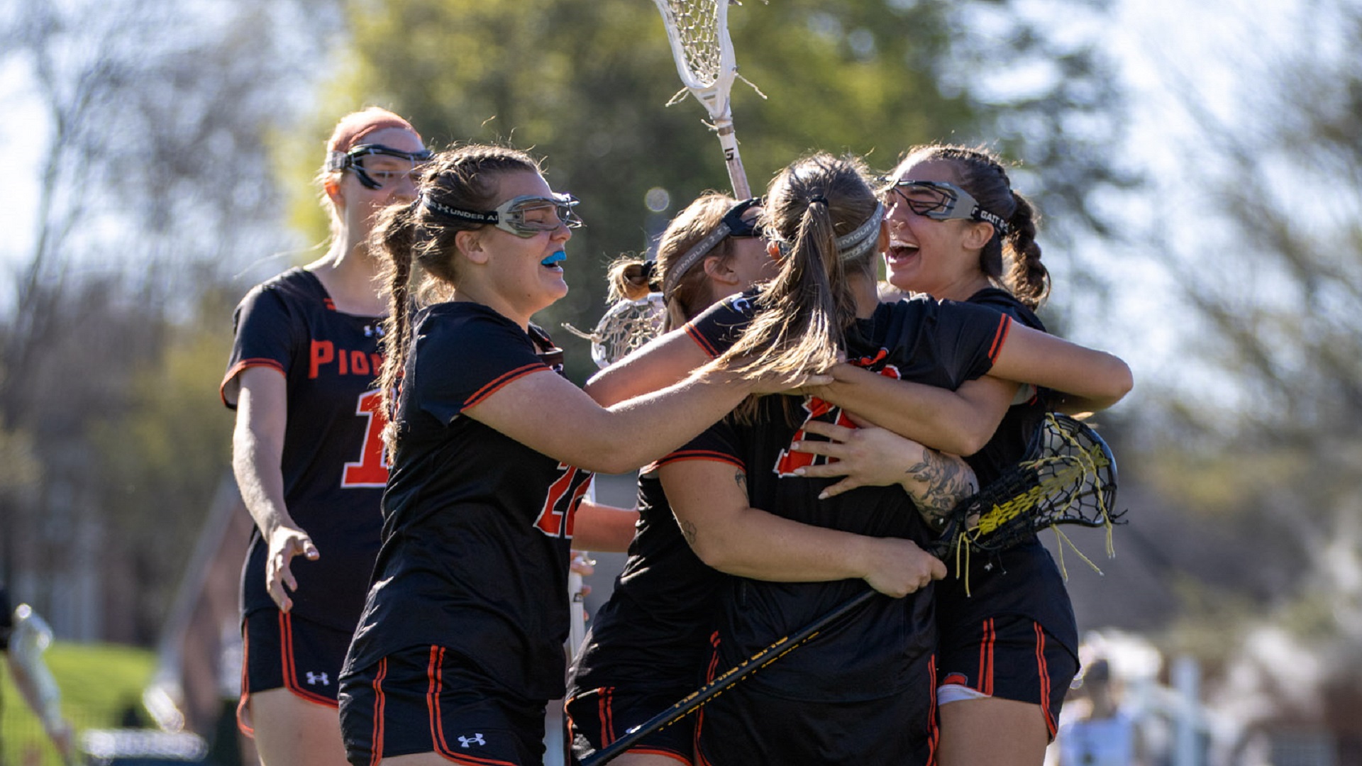 One of 24 goal celebrations by the Pioneers against Emory & Henry (photo by Kari Ham)