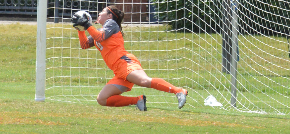Hannah Graham makes one of her seven saves in Sunday's scoreless draw with Palm Beach Atlantic (photo by Matt Bumgarner)