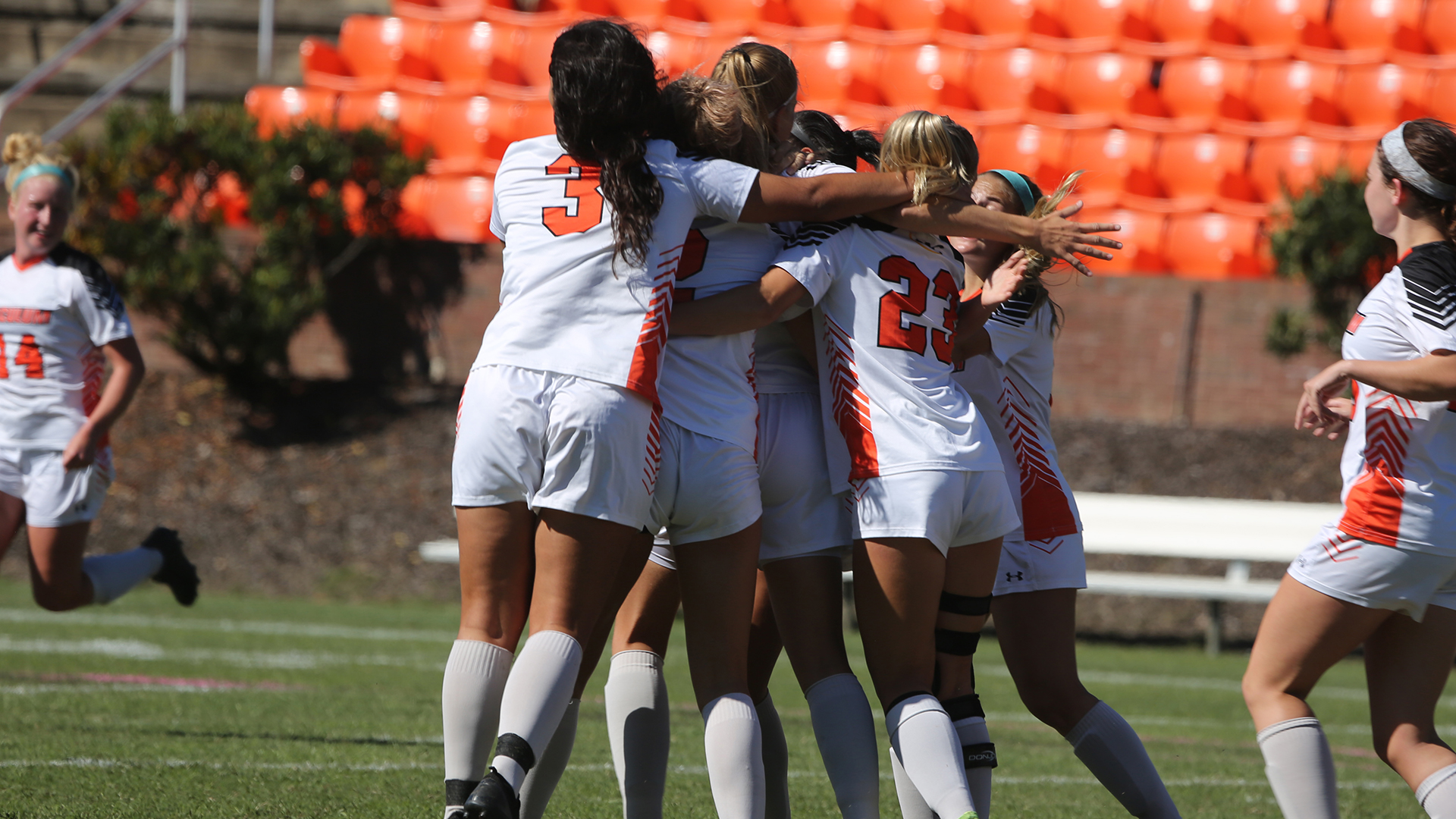 The Pioneers celebrate around Yvette Raaijen after her goal gave TU a 1-0 lead over Lenoir-Rhyne